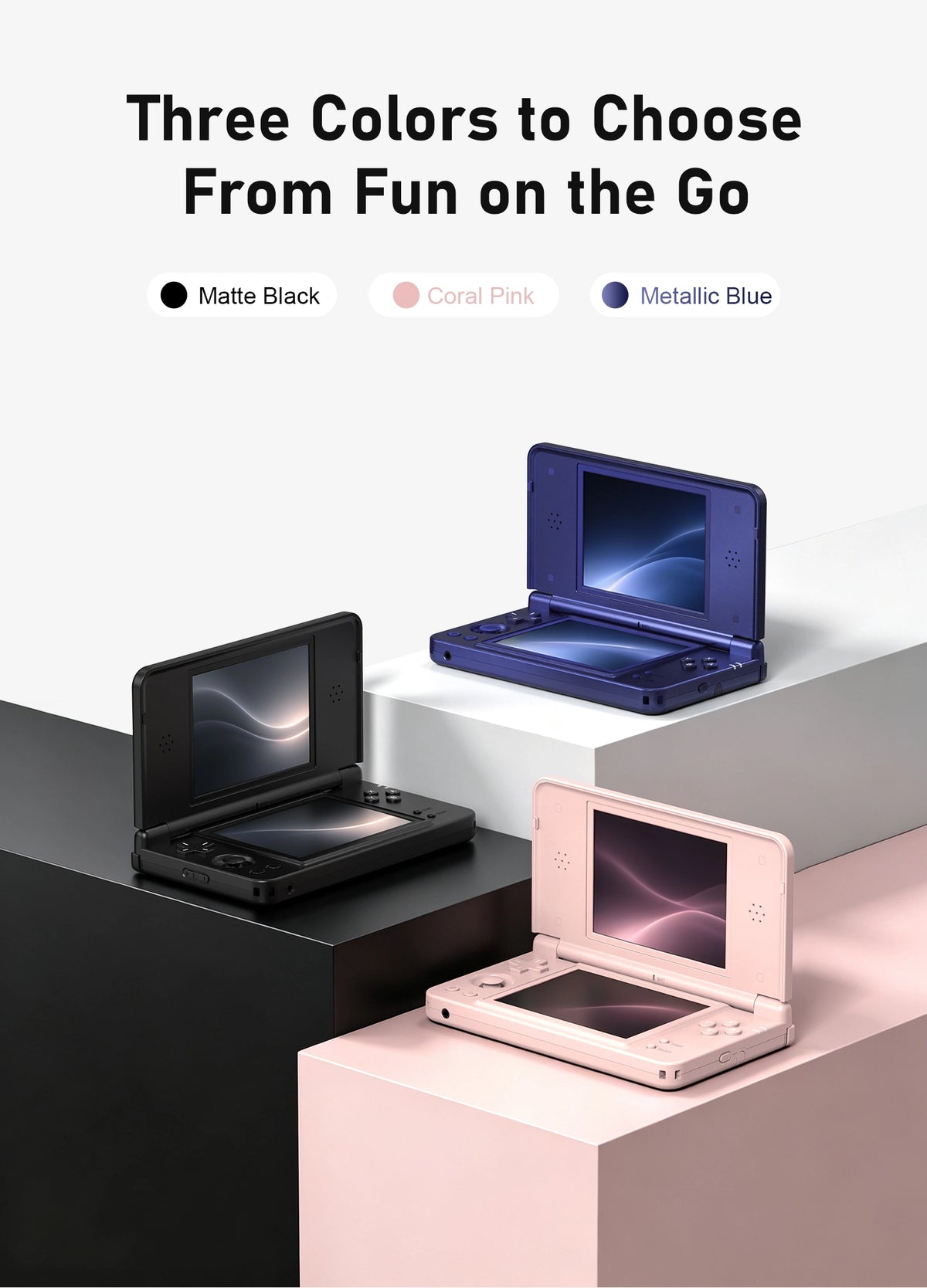 Three open dual-screen handheld game consoles in matte black, coral pink, and metallic blue on tiered display blocks.