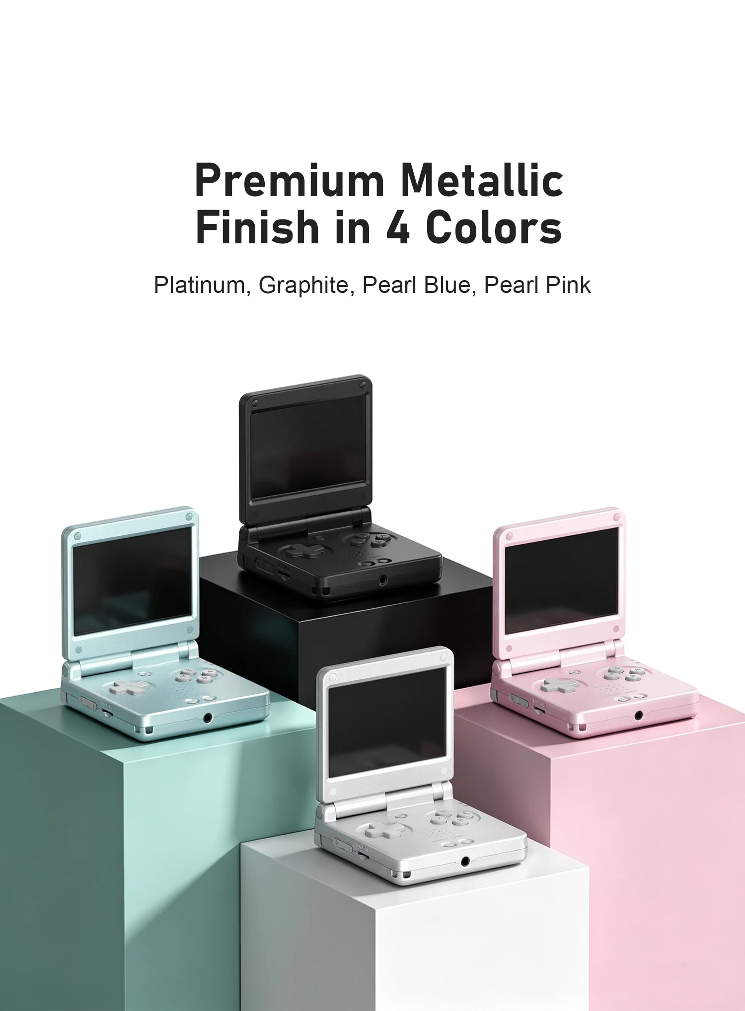 Four clamshell handheld game consoles in black, silver, blue, and pink with metallic finish options